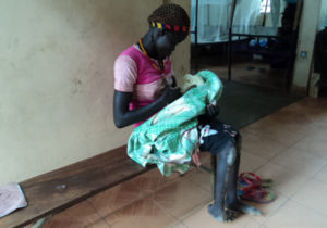 cripple-mum-attending-her-new-born-in-children-ward